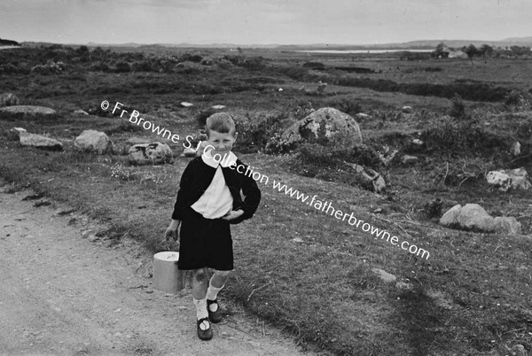 BOY CARRYING WATER